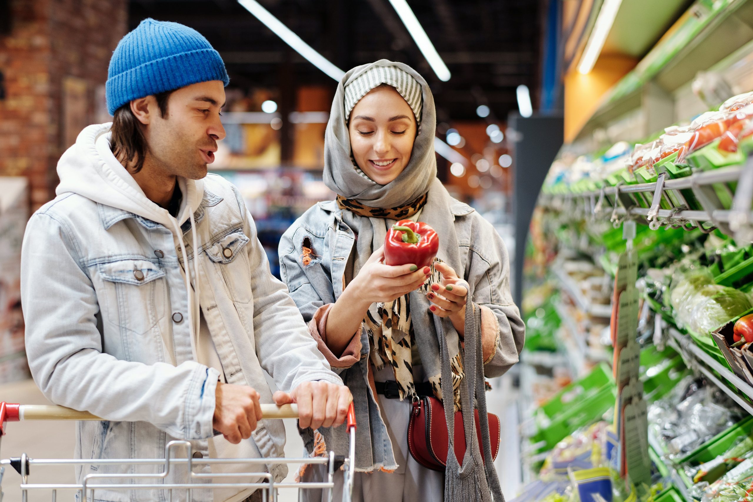 Happy Couple Buying food from a supermarket